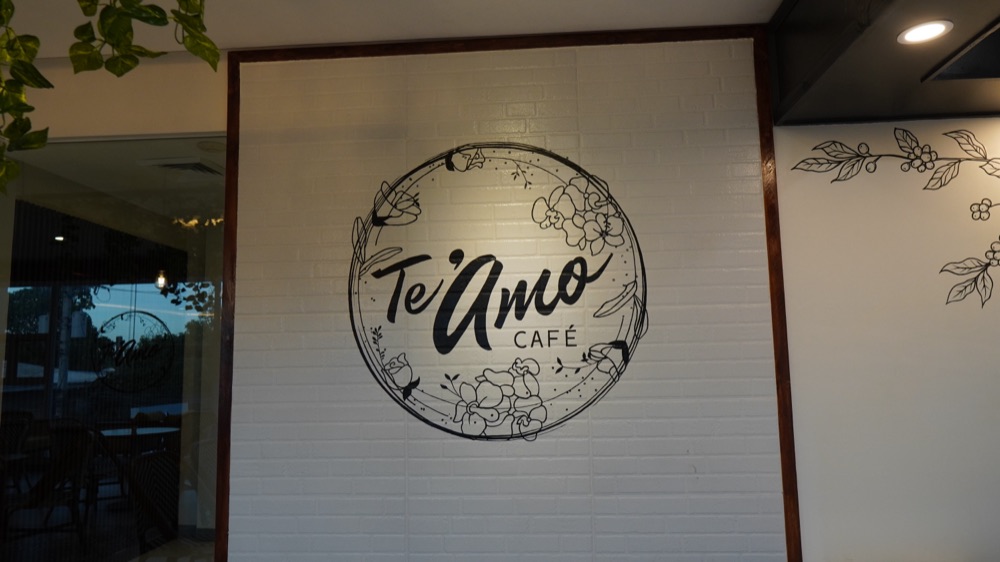 Coffee and a light plate on a table by the window at Te'Amo Café, Cebu City