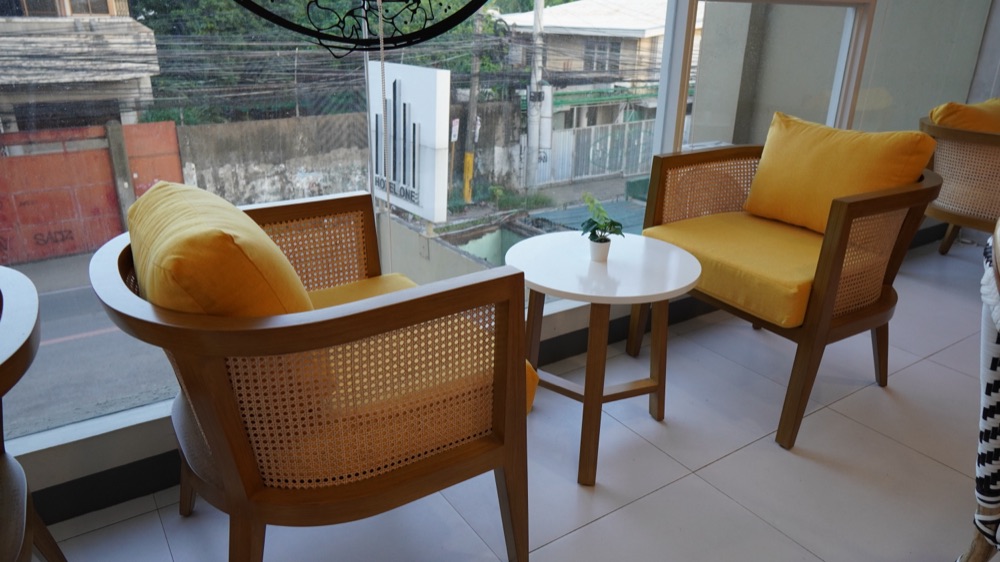 Yellow armchairs by the window
