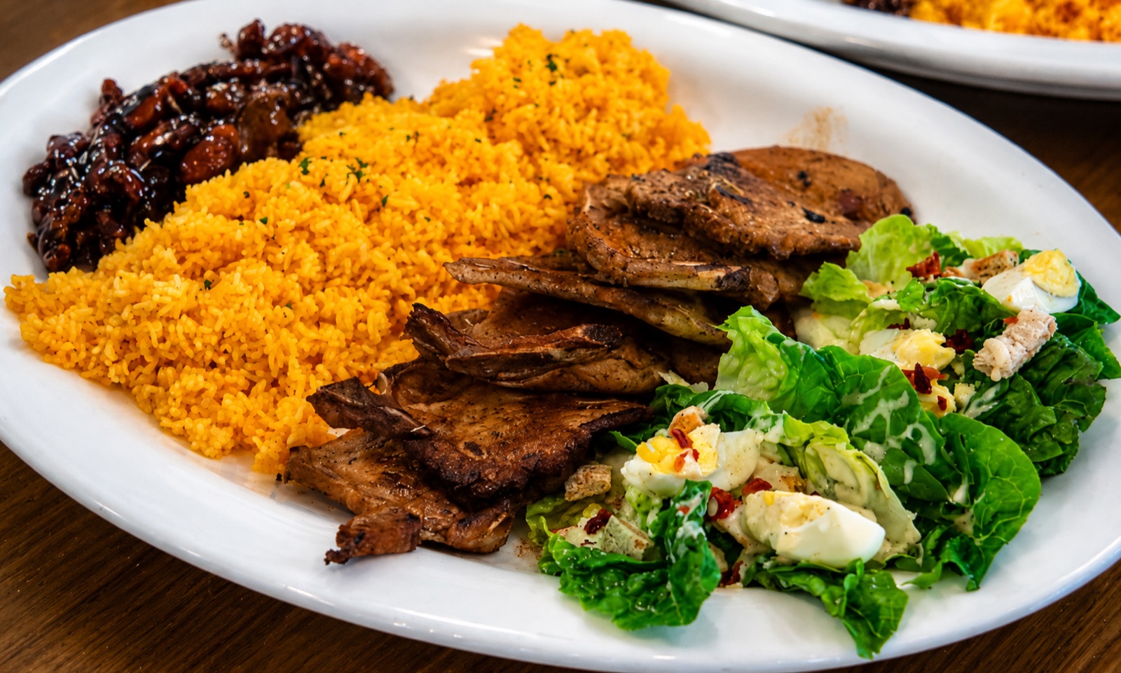 Sharing platter: garlic rice, beef, longganisa and salad